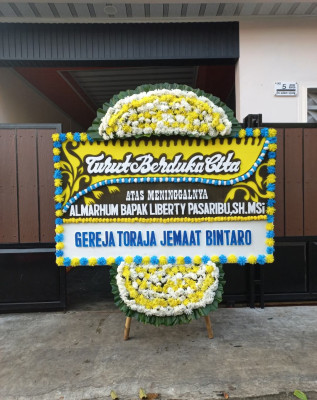 Papan Bunga Duka di Gupura